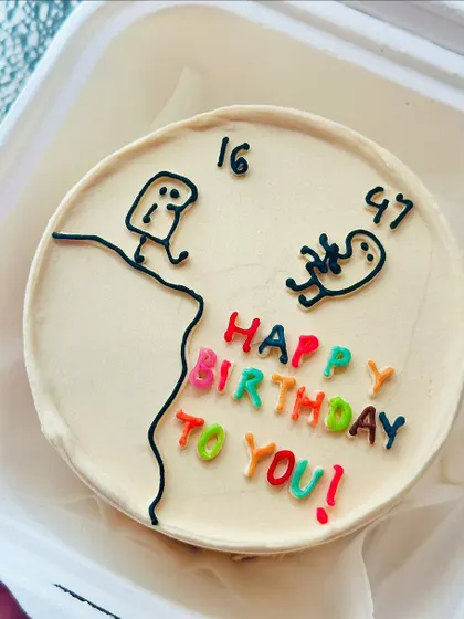 A funny and relatable meme cake about age. The simple stick figure illustrations and colorful text make this bento cake a guaranteed hit.
