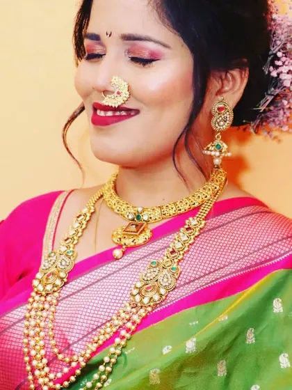 A beautiful candid shot of a Maharashtrian bride. Her smile and the stunning traditional jewellery create a picture of pure happiness.