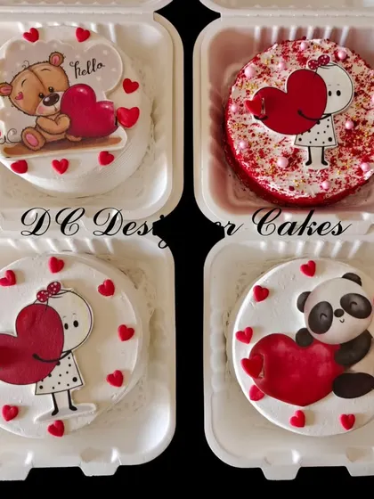 A collection of Valentine's Day bento cakes, each with a unique and adorable design. These mini cakes are a wonderful way to send a sweet message to your loved ones.