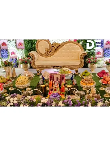 A closer look at the traditional offerings and Marapachi dolls arranged beautifully in front of the baby shower stage, adding to the authenticity of the Seemantham ceremony.