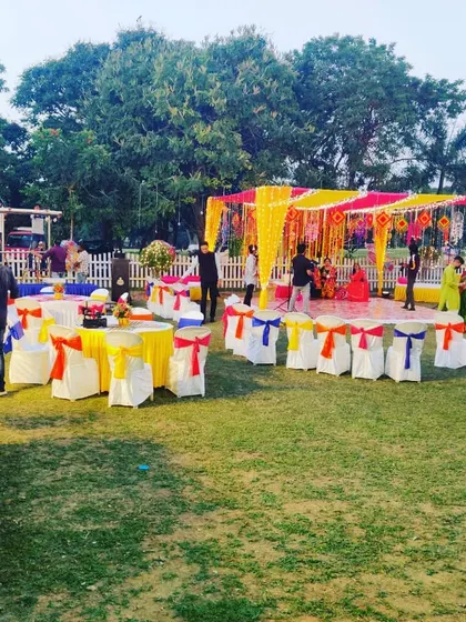 A wide view of an outdoor Mehandi celebration we catered. We have experience managing food service for large, open-air events with complex logistics.