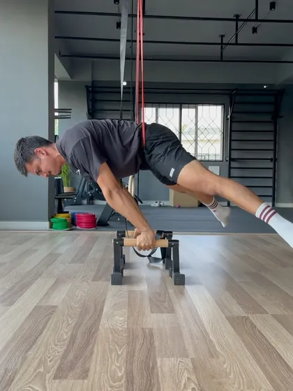 Another angle of the straddle planche progress. The use of bands allows for progressive overload in skill work.