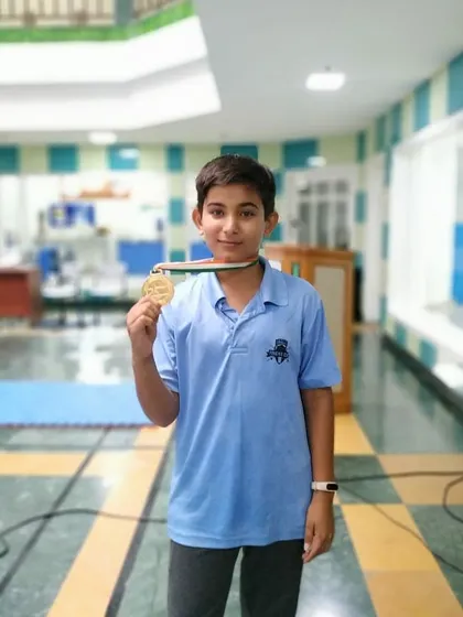 A proud gold medalist from the Delhi State Fencing Championship. This victory in the U-12 Foil category is a testament to his dedication and our focused training.