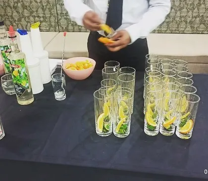 A close-up of the mocktail preparation process, ensuring every drink is perfectly crafted.