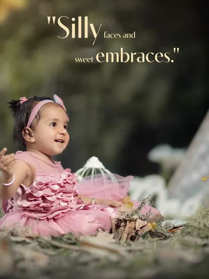 Silly faces and sweet embraces. A candid moment of a little girl playing in the leaves during her outdoor photoshoot.