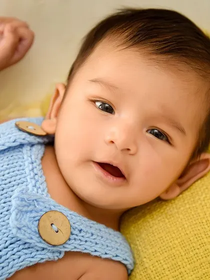 A perfect close-up of a newborn's sweet face. These are the tiny details you'll want to remember forever.