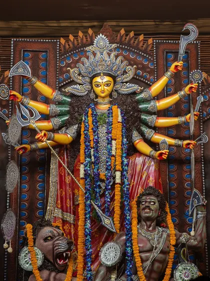 A stunning, detailed idol of Goddess Durga. I focused on capturing the artistry and powerful expression of the idol, which is the centerpiece of the festival.