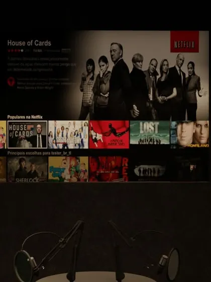 When not used for recording, the screen serves as a backdrop or for watching content. The microphones can be easily moved aside.