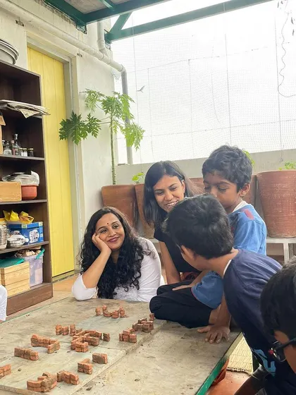 Our founder Bhavana and a facilitator engage with the children, discussing their ideas for the marketplace model. We foster an environment of dialogue and mutual respect.