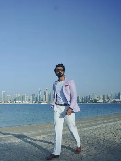 Another shot of my beach walk in Dubai. The combination of a sharp suit and a beach setting is the essence of a modern destination wedding.