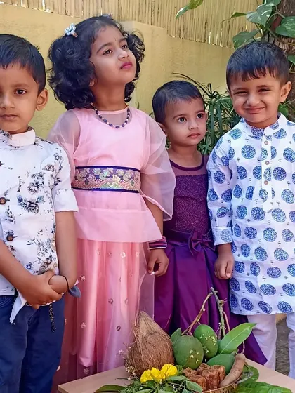 A group of friends posing in their traditional clothes for Ugadi.