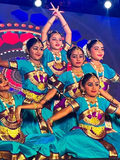 Look at the focus and poise of my young Bharatanatyam dancers. We build a strong foundation in classical dance, preparing students for stage performances and cultural events like this Onam celebration.