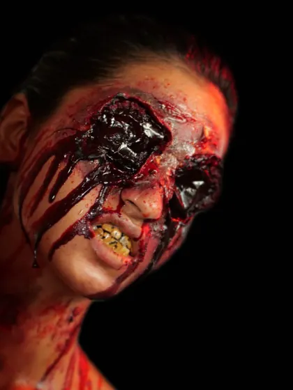 A chilling "missing eye" SFX look. These images showcase the graphic and gory details of horror makeup, a specialized skill I teach for film and Halloween projects.