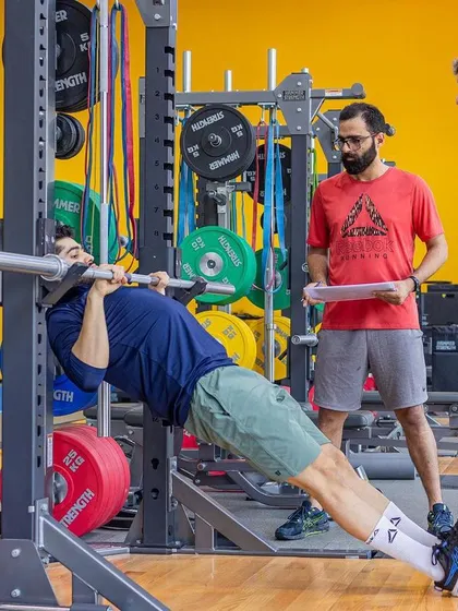 Assessing upper body strength with an inverted row during the UKSCA course at our high-performance center.
