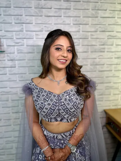 The complete look is modern, chic, and perfect for an engagement party.