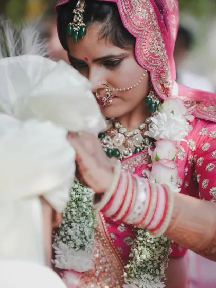 An emotional and intimate moment during the wedding ceremony, captured from a close-up perspective.
