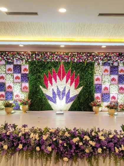 A wide shot of the geometric floral stage.