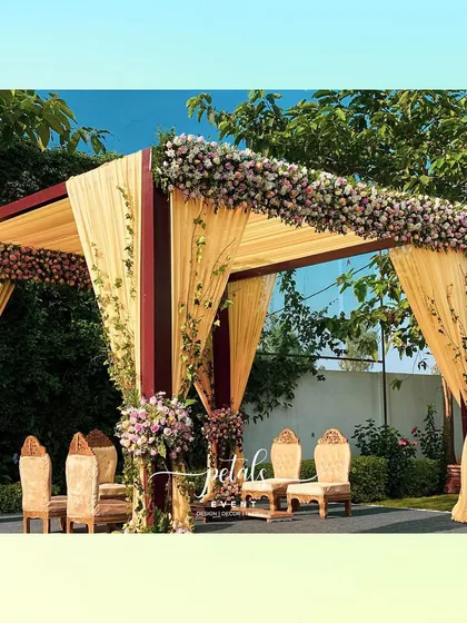 Another angle of the contemporary mandap, highlighting the intricate details of the floral design and the elegant seating arrangement. This setup is perfect for a couple looking for a vibrant and stylish wedding.