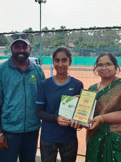 Posing with Kanisha, our Girls Under 14 winner. Supporting our players through their tournament journey, from the first round to the final victory, is what we do.