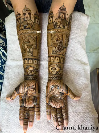 A breathtakingly detailed bridal mehendi that extends up the arms. This design features portraits, palace scenes, and royal elephants, making it a true work of art for the bride's special day.