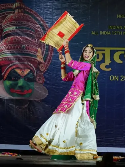 A series of photos from a Gidha performance at a national competition in Pune, showcasing the colorful costumes and lively spirit of this Punjabi folk dance.