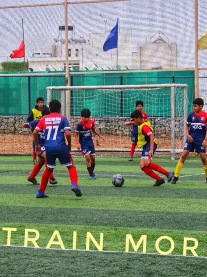 Train more, improve more. Players engaged in a competitive practice match, putting their skills to the test.