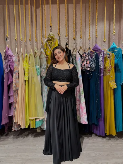 Black is a timeless classic that never goes out of style. This black lehenga set with a delicate lace blouse is a perfect addition to any trousseau, offering a chic and bold statement for any evening event or reception party.
