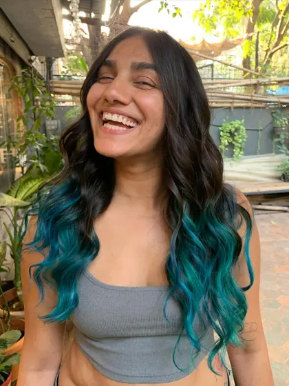 A happy client with her new ocean-inspired hair. The turquoise dip dye is so fun and playful. (No filter)