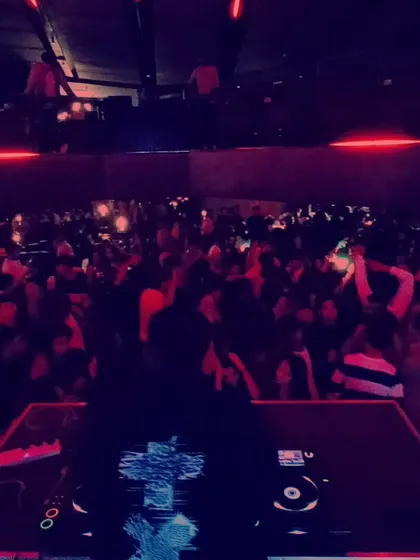 A wide shot of one of my best shows yet, with the entire club floor filled with people dancing.