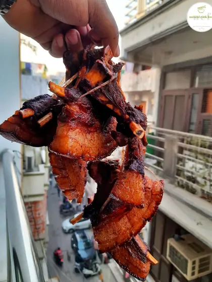 Crispy fried pork ribs, skewered and ready to be enjoyed.