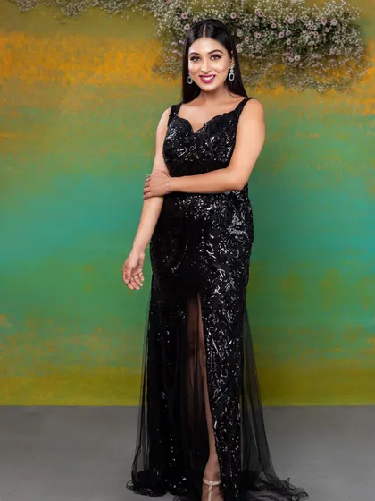 Another full-length view of this glamorous look, showing how the makeup and styling work together to create a cohesive and stunning image.