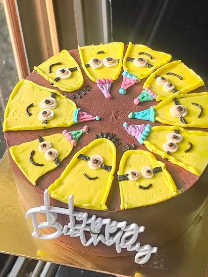 Bello! A fun and quirky Minion-themed cake where each slice is a different Minion character. This pull-apart style cake is great for parties and easy to share.