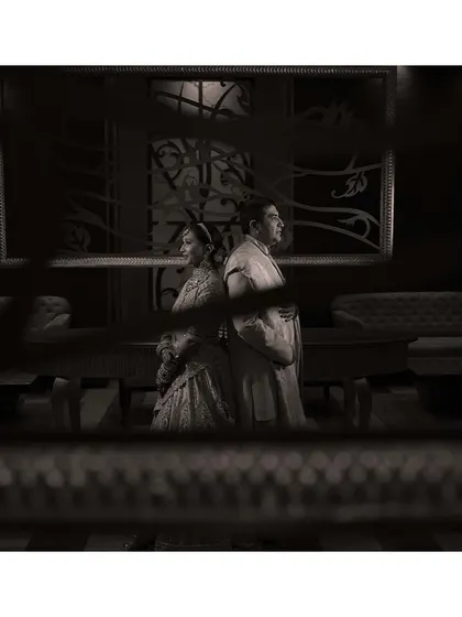 A creative, moody shot of the couple. We use interesting angles and compositions to create artistic portraits that are still authentic to the moment.