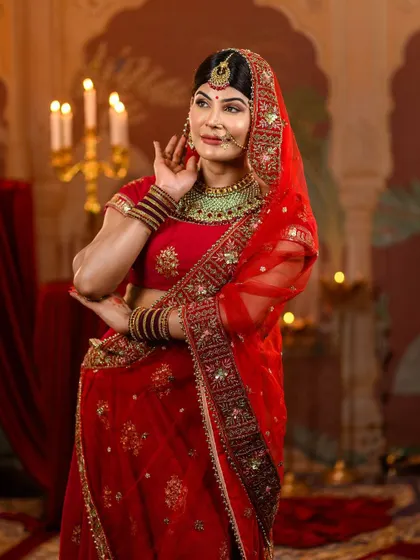 Capturing a classic pose reminiscent of the film, this shot shows the flow and drape of the Jodhabai costume. We help you with posing to bring the character to life during your photoshoot.
