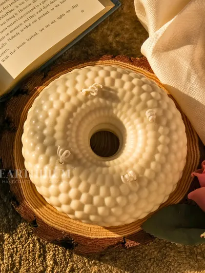 Another version of my 'Ethereal Halo Candle', this one with a honeycomb texture. It's a unique, multi-wick sculptural piece that serves as a stunning centerpiece.