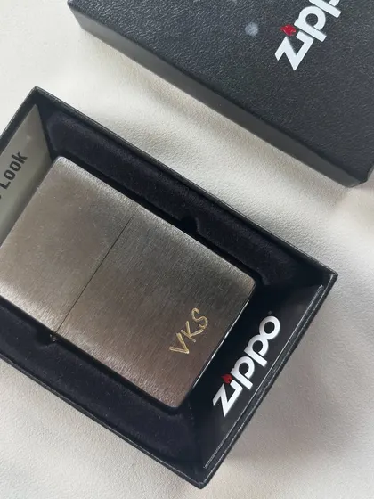 Did you know your favorite Zippo can be engraved? I did a freehand bold engraving on this metal Zippo, with initials on one side and a special date on the other. It makes for such a classy and clean statement.
