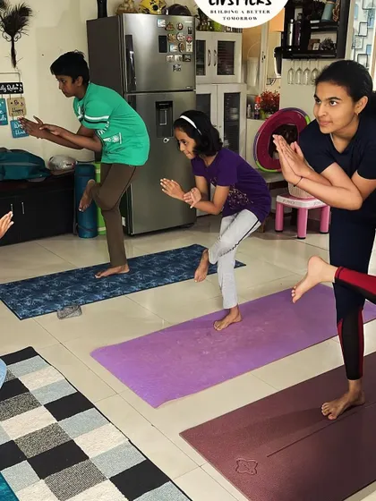 A duplicate of image 248, showing a group of kids enjoying a balancing pose together.
