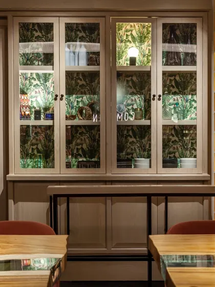 Our display cabinets showcase some of the ingredients and retail products we offer, blending the dining experience with a touch of our marketplace concept.