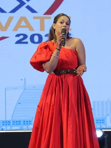 Dressed in red for the ROXX ELEVATE 2025 gala. I believe in not just hosting an event, but becoming a part of its story and vision.