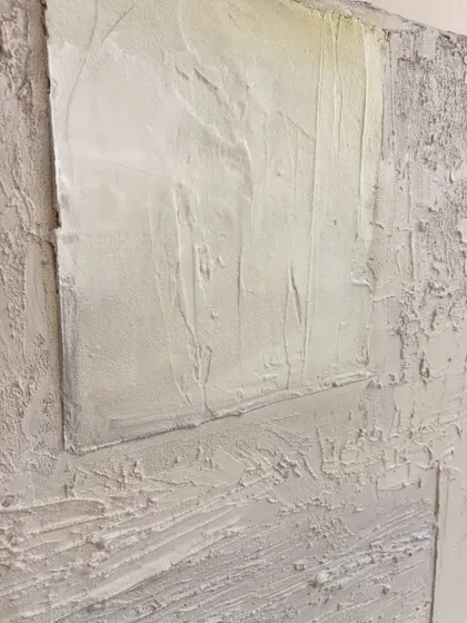 Another detail shot of the Houston commission, highlighting the layered effect of the texture work. The neutral color palette allows the sculptural quality of the piece to be the main focus.