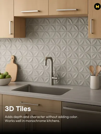 3D tiles are a great way to add depth and character without adding color. These white tiles with a floral-inspired pattern create a subtle yet impactful backsplash in this monochrome kitchen.