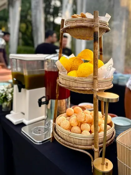 A classic pani puri station, complete with puris, fillings, and dispensers for spicy and sweet water. It's an essential part of any Indian celebration.