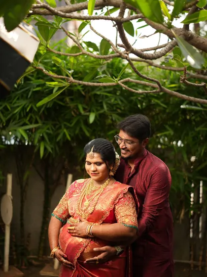 My favourite client Shruthi at her Valaikaappu (baby shower). I draped her beautiful red silk saree to be comfortable and elegant, ensuring she felt special on her big day.
