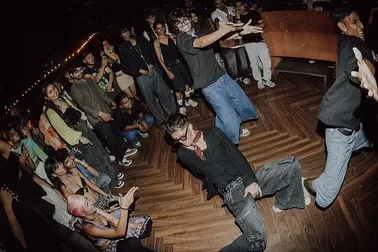 A fisheye view capturing the chaos and fun of our club performance. This is the "maza aagya" moment we aim for at every party.