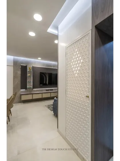 A side view showing how the compact mandir unit fits perfectly into the home's layout, providing a dedicated spiritual corner without disrupting the flow of the space.