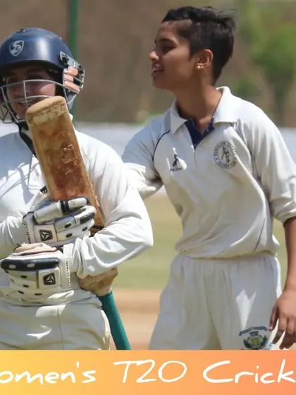 A moment of encouragement between two players on the field during a match.