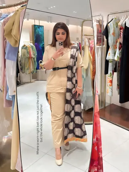 Here, a simple beige co-ord set is transformed into a chic office look with a printed dupatta and a structured black belt. This demonstrates how to create a polished fusion officewear look.