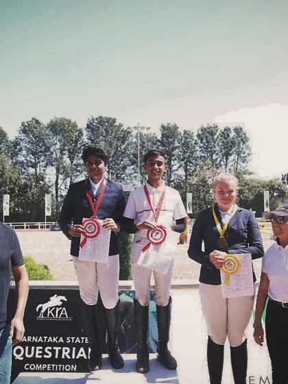 Our riders standing proudly on the podium at the Karnataka State Equestrian Competition. Moments like these are the culmination of countless hours of practice and dedication.