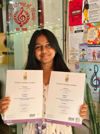 Talk about a double achievement. We're absolutely buzzing with pride for Nila Rai, who successfully cleared two Trinity College exams, scoring in both Grade 6 Western Vocals and Grade 3 Guitar. This showcases her incredible versatility and dedication.