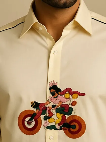 This detailed shot focuses on the collar and the top of the cyclist embroidery. The quality of the fabric and the precision of the stitching are evident, showcasing true craftsmanship.
